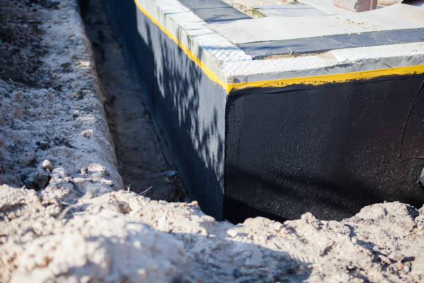 Professional Waterproofing technician working in Hornell, NY